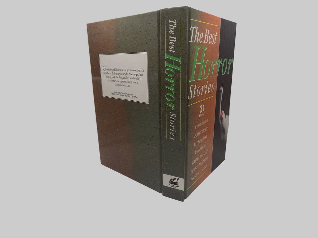 Book titled 'The Best Horror Stories' on a textured white surface