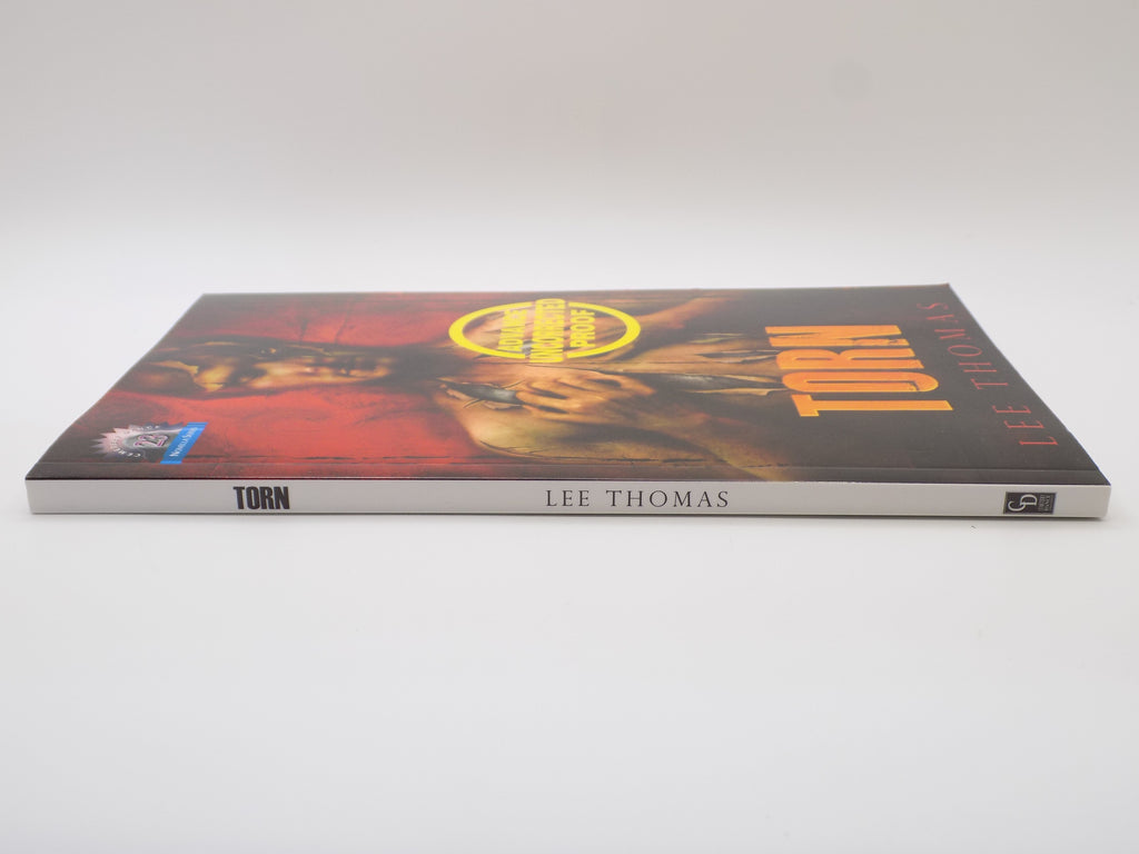 Torn  by Lee Thomas [Advance Uncorrected Proof] ·Cemetery Dance, 2011