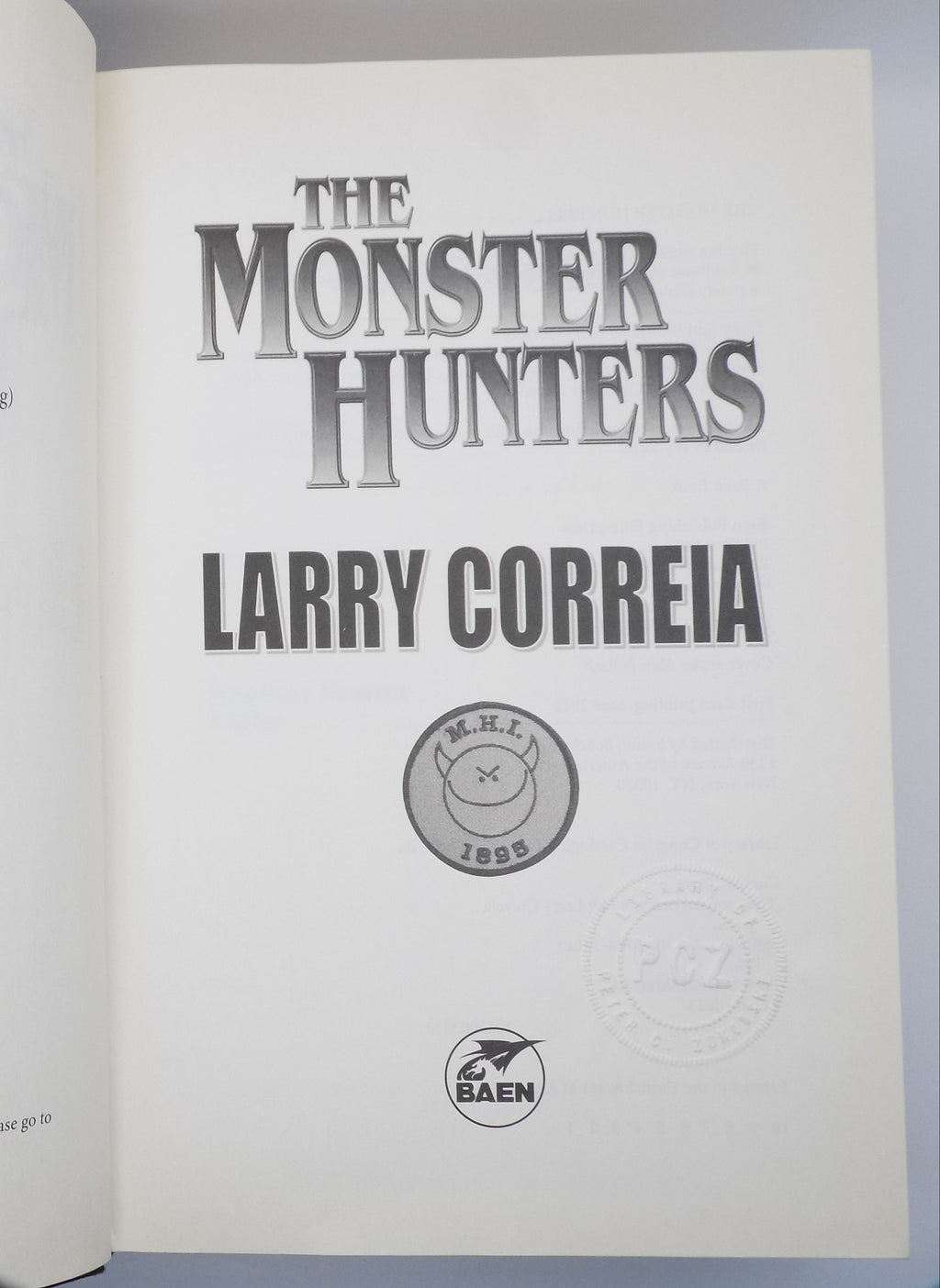 The Monster Hunters  by Larry Correia  ·Baen Books · First Edition