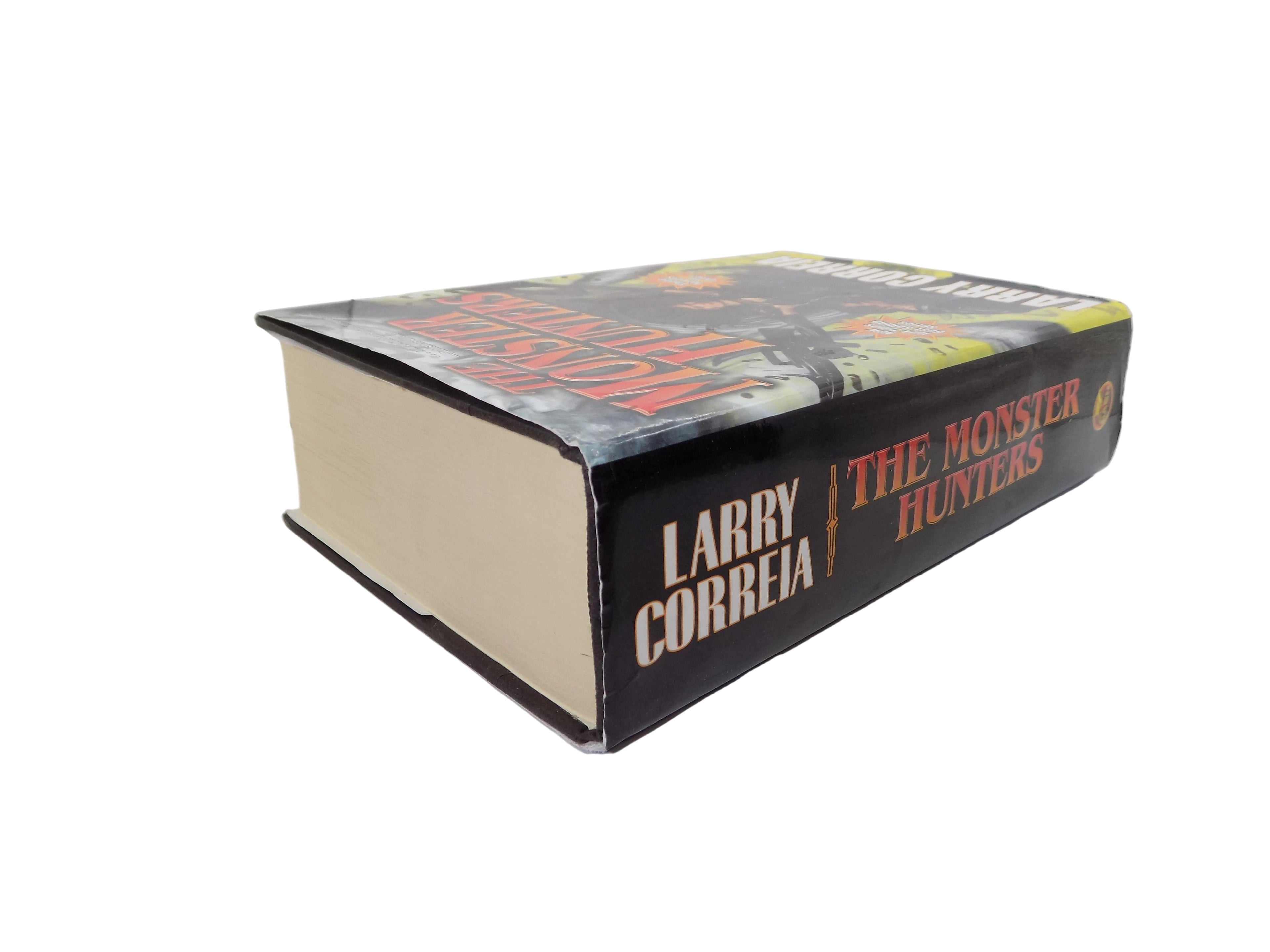 The Monster Hunters  by Larry Correia  ·Baen Books · First Edition