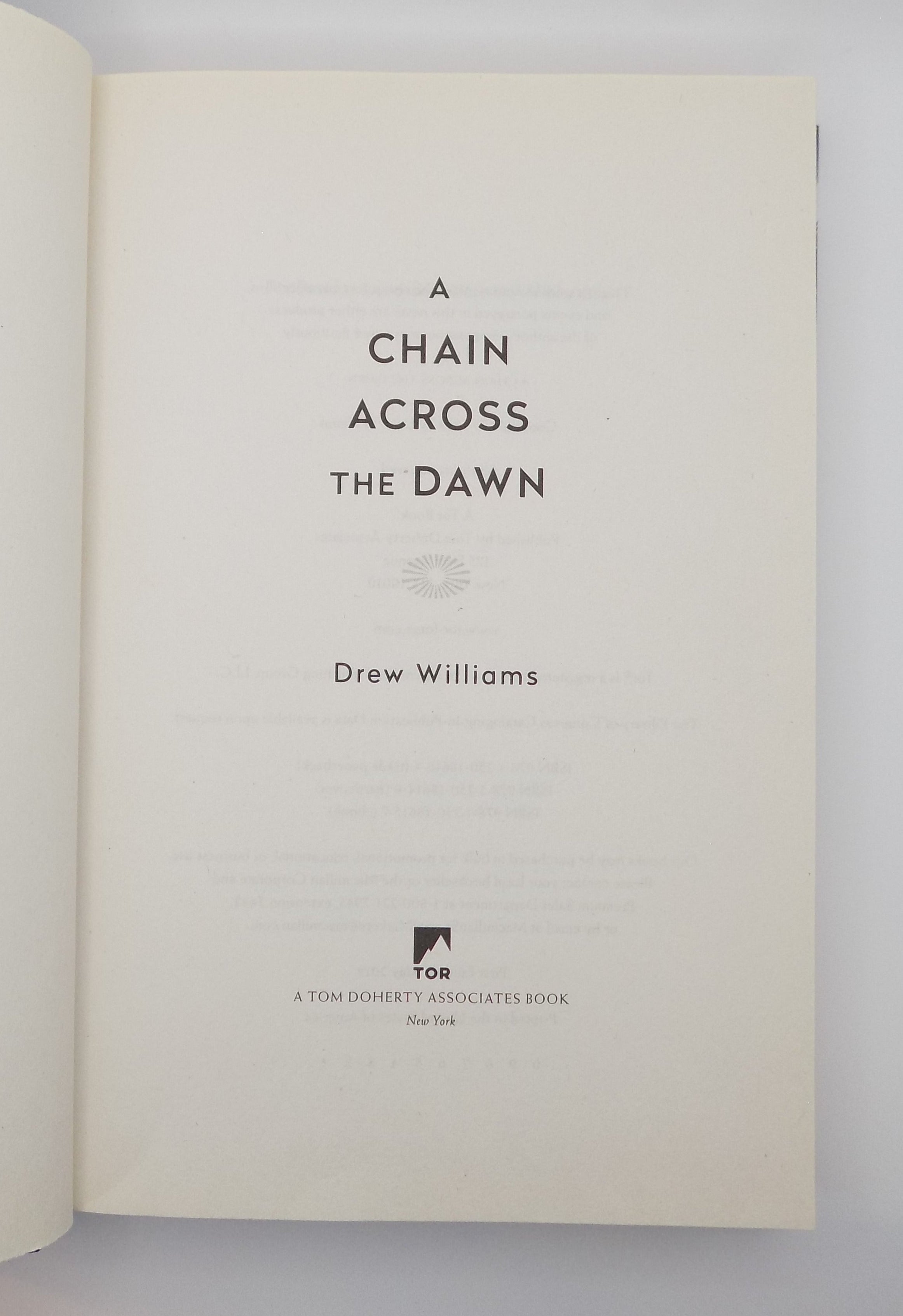 A Chain Across The Dawn by Drew William · Tor, 2019 · First Edition